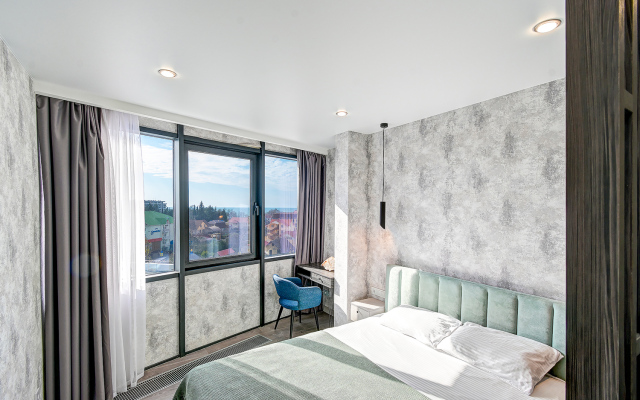 Uyutnye Morskaya Simfonya-2 s vannoj, vidom na more, bassejnom na territorii Apartament