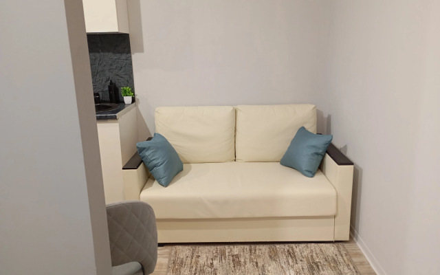 Квартира Уютная студия в рядом с ДРКБ