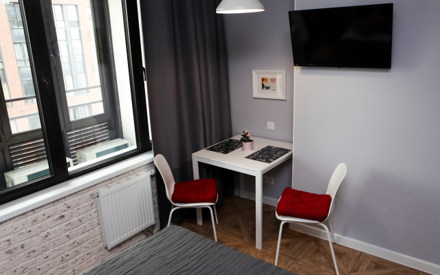 V Neboskrebe s vidom na Ostankinskuyu bashnyu Apartments 1