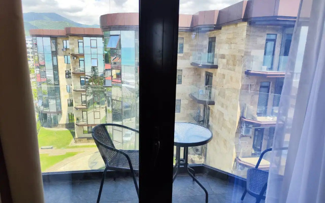 Sovremennye S Lodzhiey Apartments