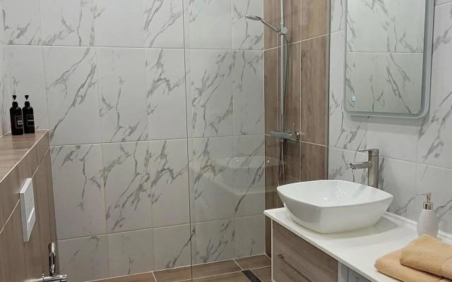 Квартира Уютная Студия в Зеленом Уголке Города