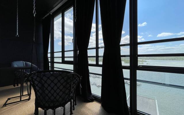 Vidovaya studiya s khammamom u reki Apartments