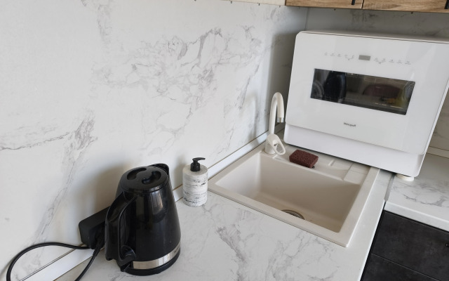 Uyutnaya s Ogromnoy Krovatyyu Flat