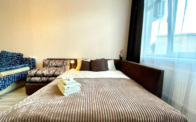 Квартира Просторная студия в привлекательном районе города