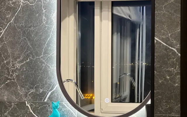 Апартаменты с панорамным видом на город и ванной