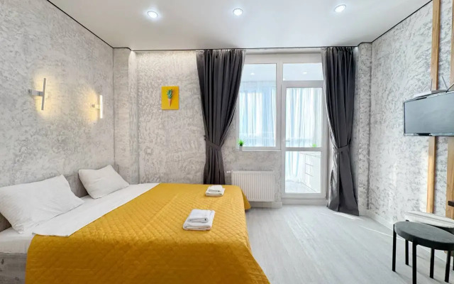 Квартира Уютная студия с панорамной лоджией