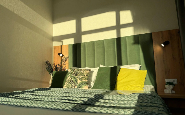 Апартаменты с балконом. 3 минуты до пляжа. Для четверых гостей.