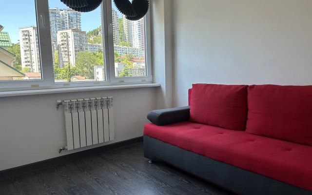 Na Volzhskoy 32a Apartments