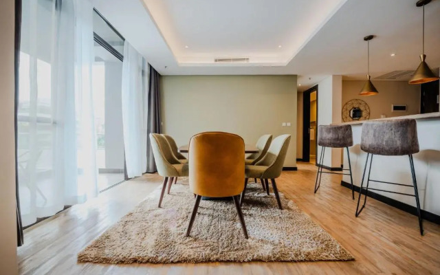 Отель Trademark Suites at Enaki Town