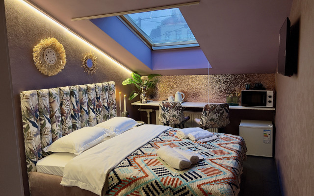 Апартаменты Мансарда