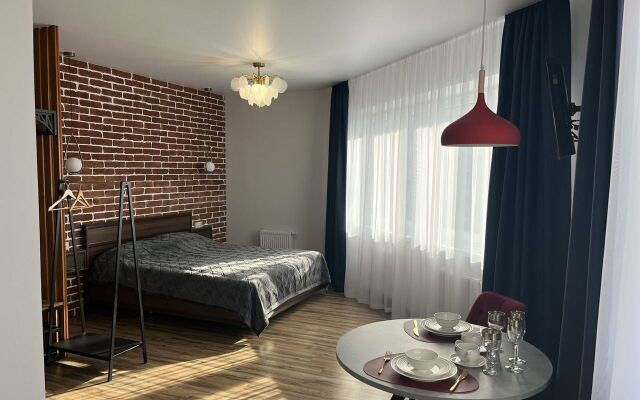 Улучшенные апартаменты Яркий Лофт панорамным видом из окна