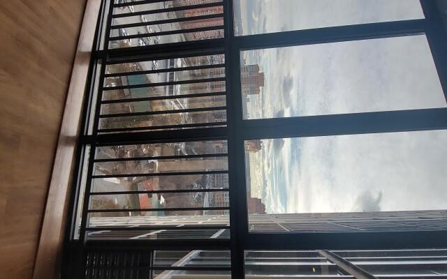 Квартира Уютная квартира-студия с видом на Бугринский мост