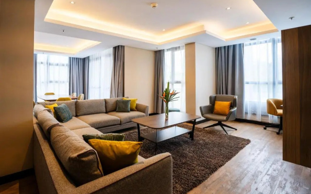 Отель Trademark Suites at Enaki Town