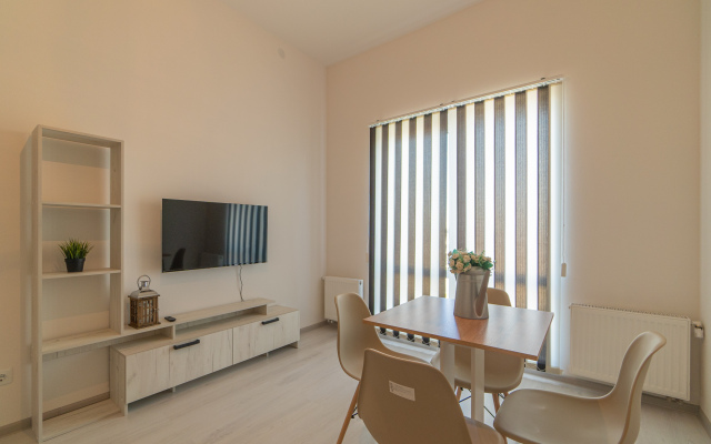 Апартаменты Двухкомнатная Квартира на Мансардном Этаже