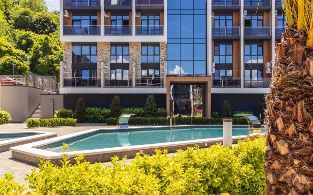 2 Orange Apart With A Swimming Pool In The Yard Apartments