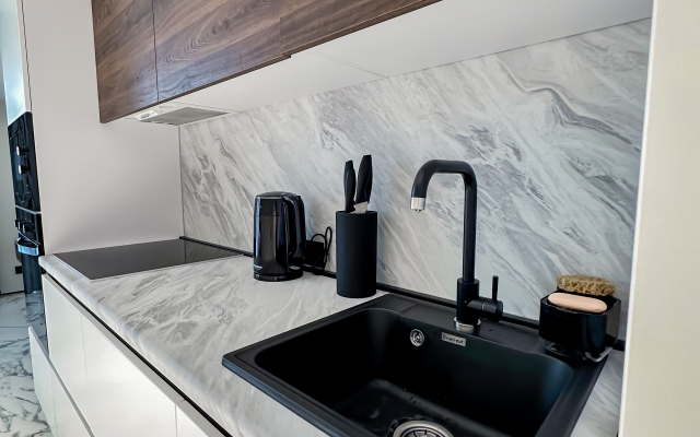 Dvukhurovnevye s basseynom Apartments