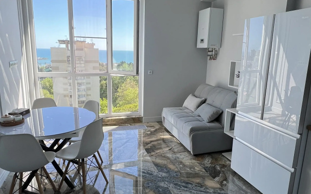 V Tsentre S Vidom Na More Flat