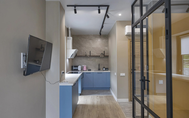 V Tsentre Goroda Apartments