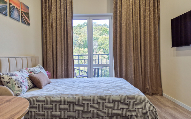 S Vysokimi Potolkami Apartments