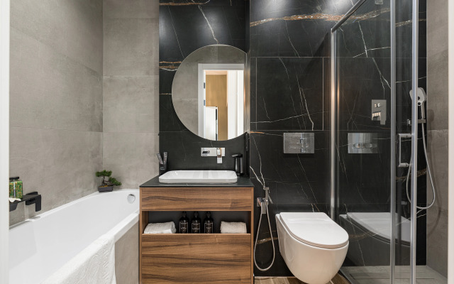 Апартаменты Сталинка после ремонта с видом на главный проспект Минска, крыши и закаты