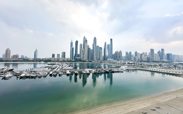 Апартаменты Keyrock Living Seaview Stay at Emaar Beachfront