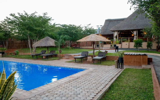 Отель The Nkhosi Livingstone Lodge and Spa Resort - фото 2