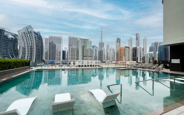 Апартаменты Luxe Waterfront 2BR with Canal & Burj Khalifa view