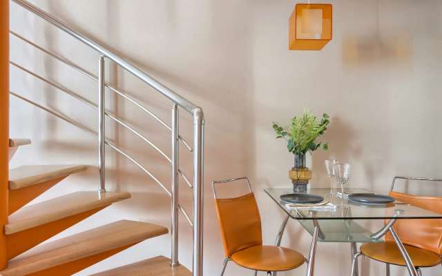 V Tsentre Goroda Apartments