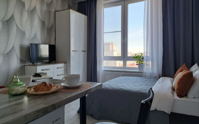 Апартаменты Wing Tower - высотная студия в центре