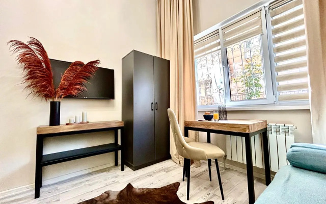 Апартаменты Двухуровневая студия Loft в центре города