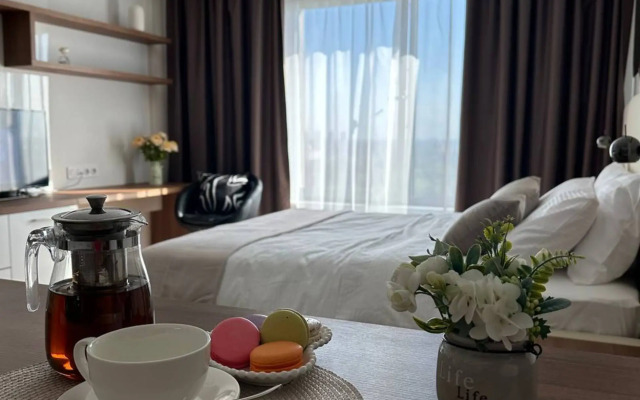 Апартаменты Стильная студия Riva на 21 этаже