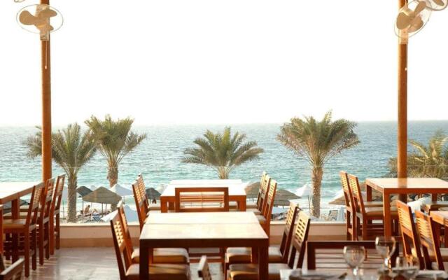 Отель Dubai Marine Beach Resort & Spa