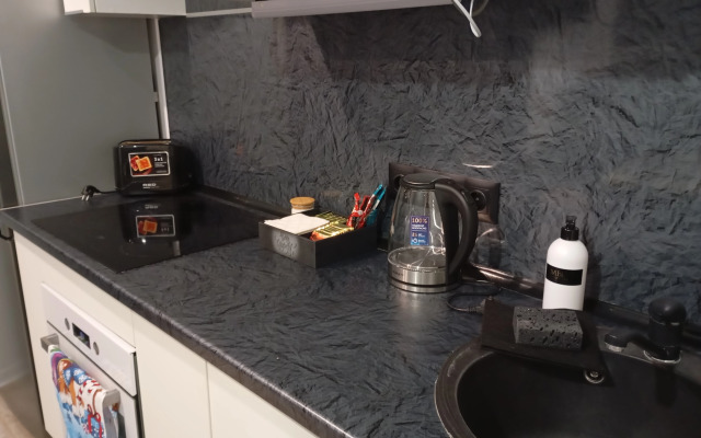 Квартира Уютная студия в рядом с ДРКБ