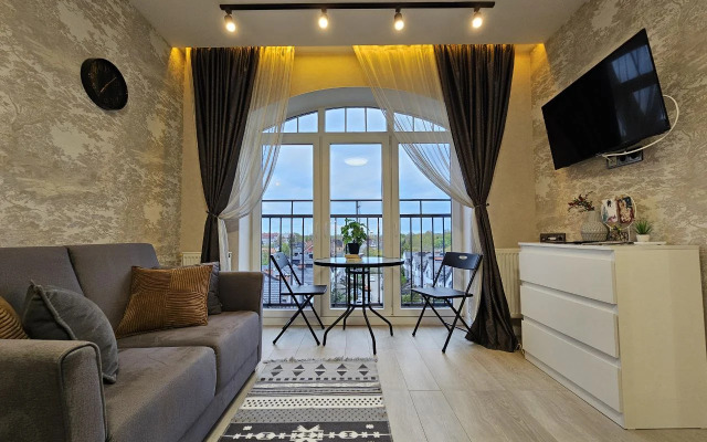 Квартира лофт над елями