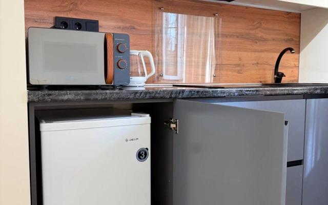 Апартаменты Уютная студия на Шамиля