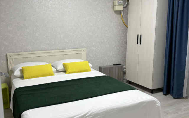 V Tsentre Goroda Apartments