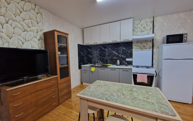 Uyutnaya i teplaya Flat