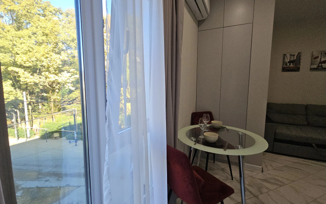 Апартаменты Уютная Студия с Бассейном в GreenPalace