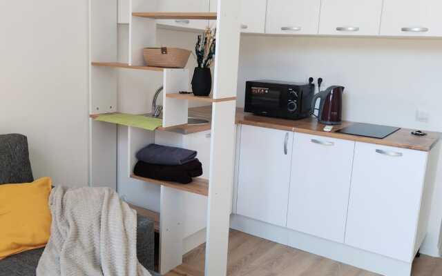 Na Ulitse Usadebny Park 1 Apartments