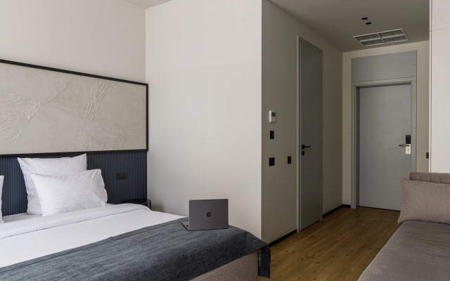 V chetirehzvezdochnom otele Blanc Hill Apartment