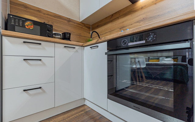 Квартира Уютная студия с видом на колесо обозрение Одно небо