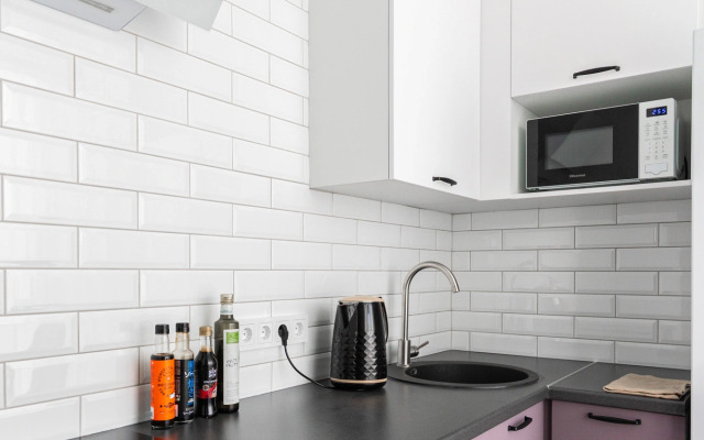 Апартаменты-студия Цветы 30 кв.м. с двуспальным диваном и панорамными окнами, 4 этаж