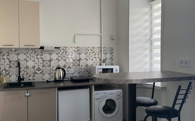 Квартира Белая Студия на Вихарева