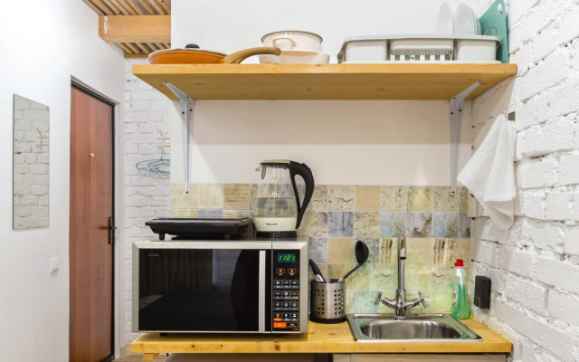 Апартаменты Roomstay Остров комфорт плюс