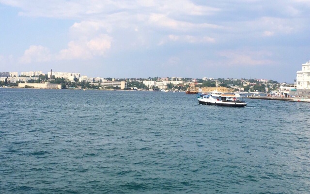 V Tsentre Goroda Apartments