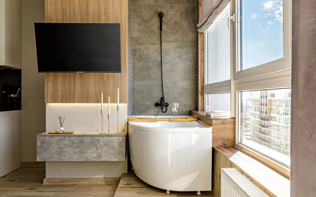 Апартаменты VIP студия с роскошной ванной у панорамного окна