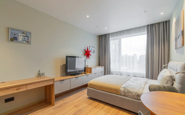 Апартаменты Уютная студия у метро Ладожская