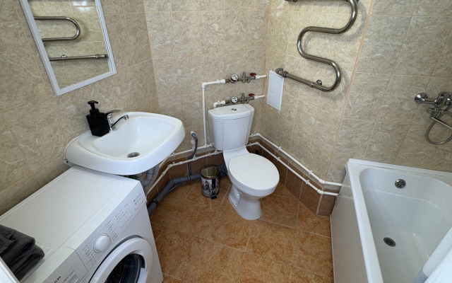 Квартира Уютна студия не далеко от зоопарка.