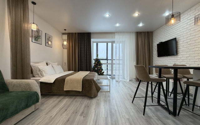 Квартира Просторная студия с панорамным видом из окна