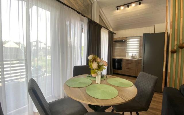 Dom s Mangalnoy Zonoy i Saunoy Aparts Haus Privat House